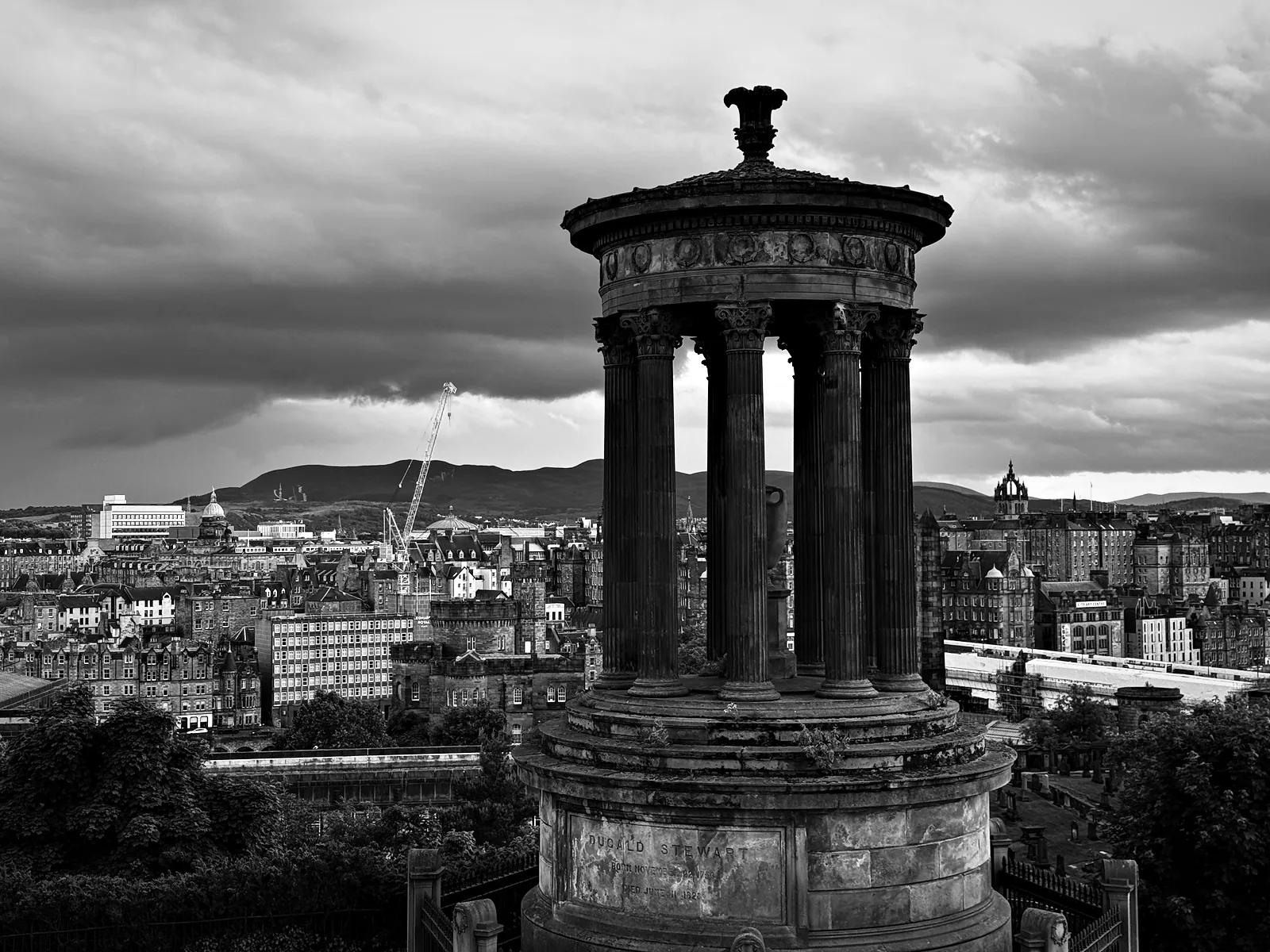 The Dugald Stewart Monument on Calton Hill with the Old Town behind it