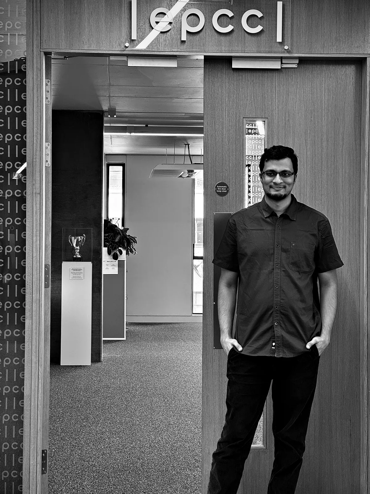 Viren at the EPCC entrance in the Bayes Centre