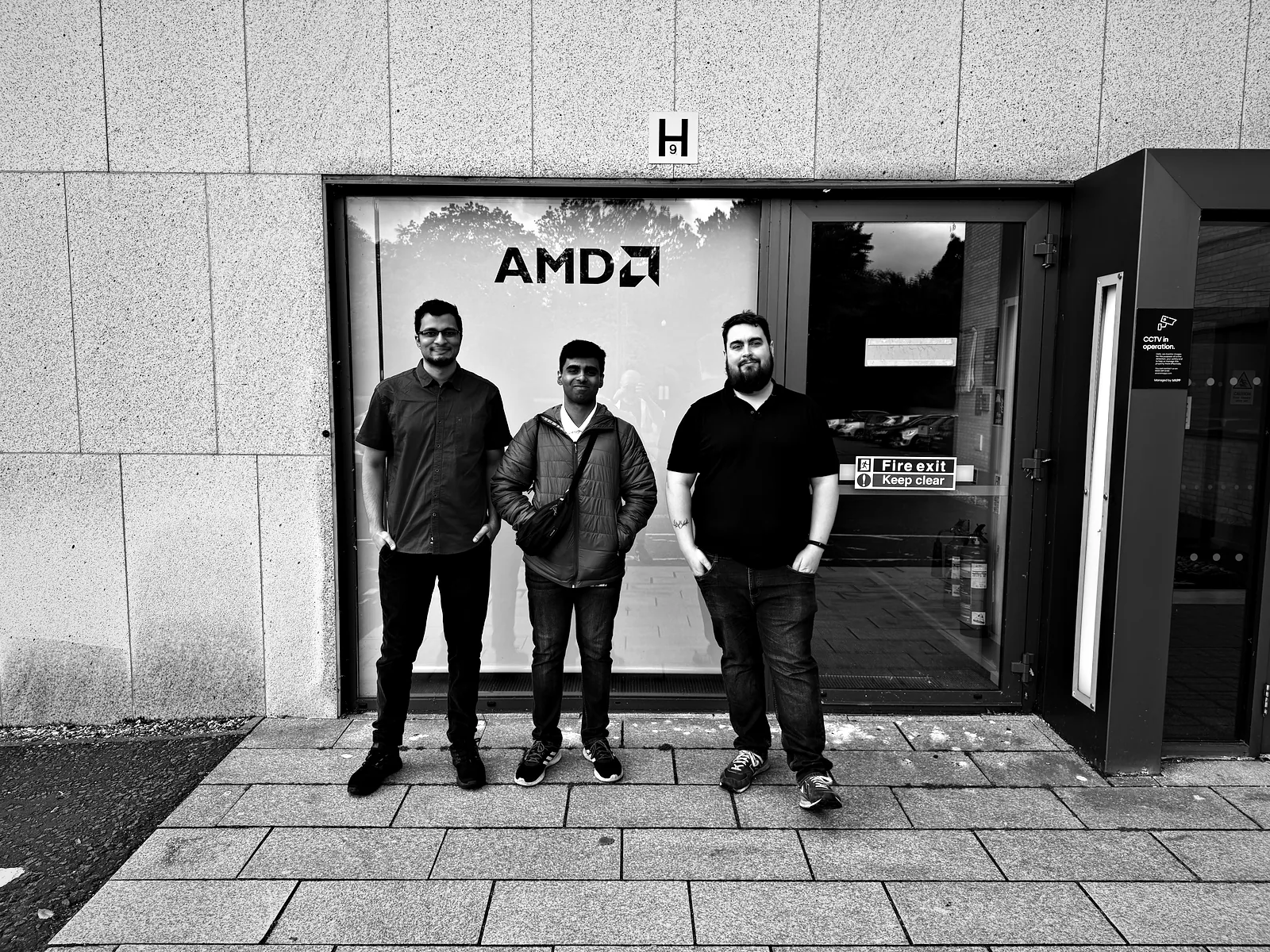 Viren, me and Craig Wilson standing at the door of the AMD office at Edinburgh Technopole